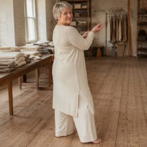 Corve Midi Knit Dress — Knitted Dresses by WOOL BARN. worn by a model.