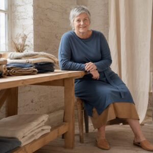 Wren Belted Knit Dress — Knitted Dresses by WOOL BARN. worn by a model.