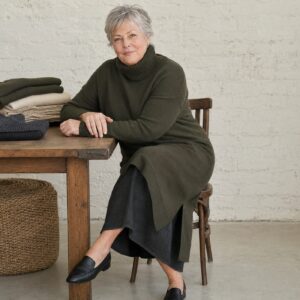 Hartley Roll Neck Knit Dress — Knitted Dresses by WOOL BARN. worn by a model.