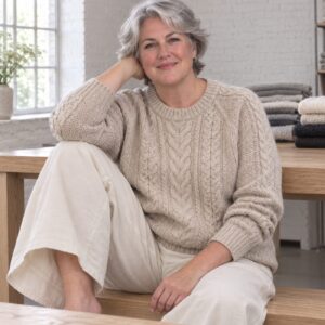 Bramble Cable Knit Jumper — Jumpers by WOOL BARN. worn by a model.