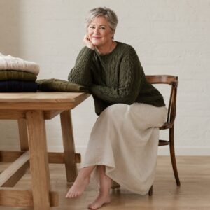 Eddisbury Cable Knit Jumper — Jumpers by WOOL BARN. worn by a model.