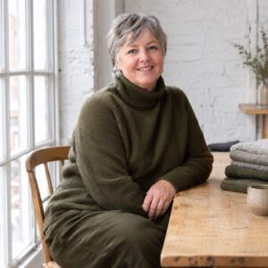 Sedge Roll Neck Jumper — Jumpers by WOOL BARN. worn by a model.