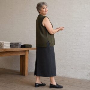 Hartley Sleeveless Knit Vest — Knitted Vests by WOOL BARN. worn by a model.